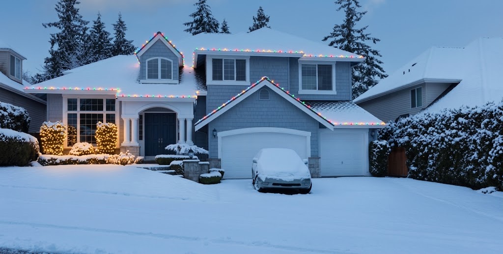 The same home lit up with Christmas lights